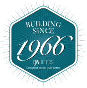 Hexagonal logo with the text "building custom homes since 1966, gwhomes, designed better built better.